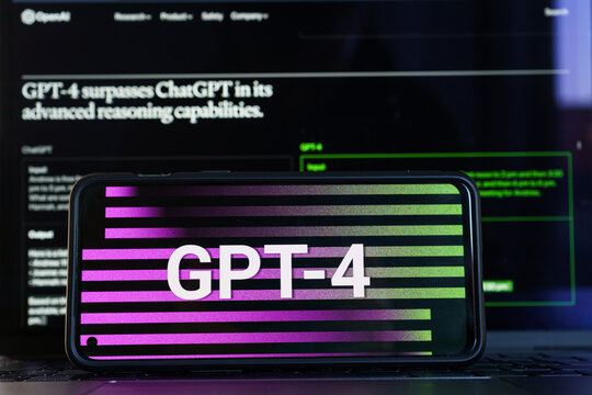 GPT - 4 on screens. OpenAI released new version of GPT 4. ChatGPT AI chatbot