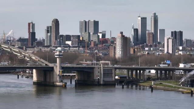 Aerial voiew showing skyline of Rotterdam and traffic on Van Brienenoord bridge durign sunny day