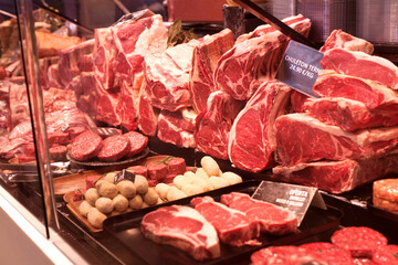 pork, beef, tenderloin, meatballs, entrecote, ham, carbonate in refrigerator on market counter