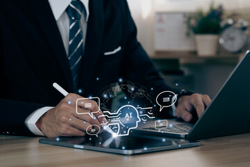 Businessman using computer chatting with an intelligent artificial intelligence asks for the answers wants. knowledge on the internet, e-learning, Robot application, conversation assistant
