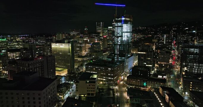 Portland Oregon Aerial v113 flyover downtown from Pearl District capturing urban downtown cityscape with shimmering exterior of high rise buildings at night - Shot with Mavic 3 Cine - August 2022