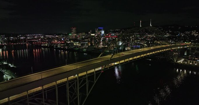 Portland Oregon Aerial V112 Flyover Willamette River And Fremont Bridge Towards Pearl District Along NW 10th Avenue Capturing Lively Downtown Cityscape At Night - Shot With Mavic 3 Cine - August 2022