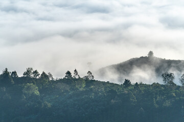 Fanciful scenery of an early morning when the sun rises over the Dai Lao mountain range, Bao Loc district, Lam Dong province, Vietnam