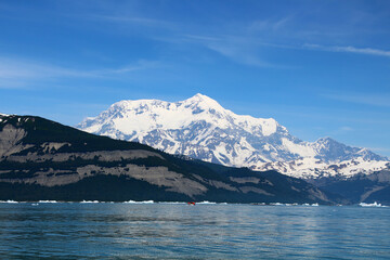 Zodiac cruising in Icy Bay-Wrangell-Saint Elias Wilderness with Mount Saint Elias in the background, Alaska 