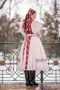 Beautiful woman wearing traditional Eastern Europe folk costumes. Slovak folk costumes.