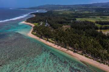 Aerial landscape view of the area around Riambel Public Beach located on Mauritius Islands South Coast with a massive and wide reef who protects the Island and long sandy beach