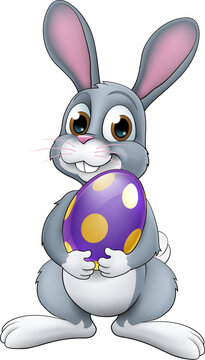 An Easter bunny rabbit holding huge chocolate Easter egg cartoon illustration