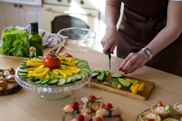 Cooking in the kitchen diet menu, healthy food, ready snacks delivery concept. Hands of the chef in the frame for cooking