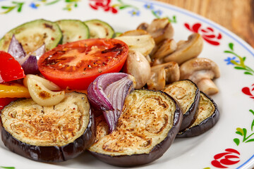 grilled vegetables on the wooden background