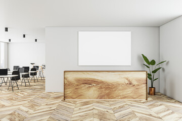 Front view on blank white poster with place for your logo or text on light wall background above real wooden reception desk in sunlit office with parquet floor and work tables. 3D rendering, mock up