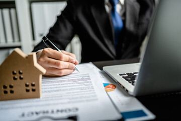 Lawyer or Agents signing sale agreement contract is the new home to a customer, deal mortgage, making sign an agreement contract residence, real estate developer.