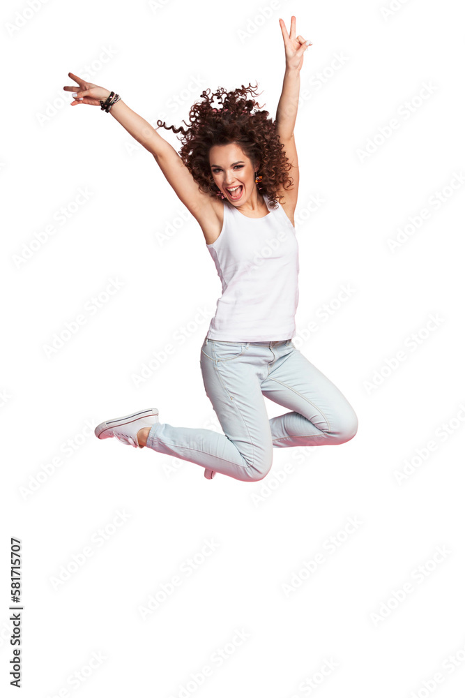 Wall mural Full length portrait of a joyful young woman jumping and celebrating over transparent background