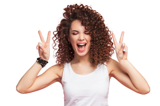 Image of happy young woman standing isolated over transparent background showing peace gesture. Looking camera