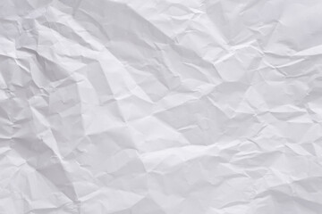 White crumpled paper texture background, clean white wrinkled paper, top view.
