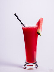 ice cold chilled fresh watermelon fruit juice in tall glass on white background beverage drink halal menu