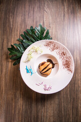 deep fried ice cream in bread with chocolate sauce on wood background sweet dessert halal kids menu