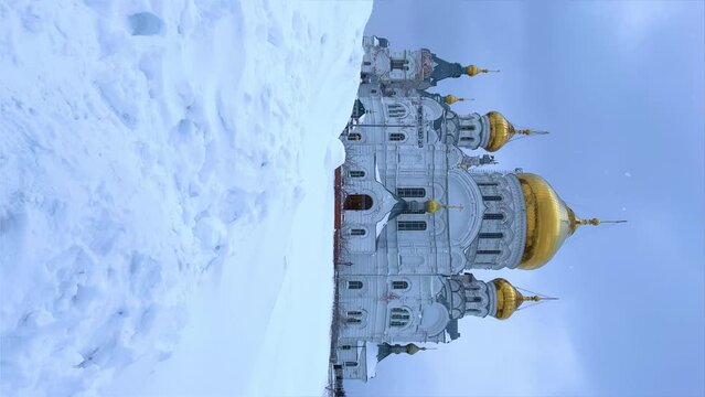 Belogorsky St. Nicholas Orthodox Missionary Monastery. Russia, Perm Krai, Belaya Gora. The temple on the hill in winter. Monastery on the background of snow. 4K