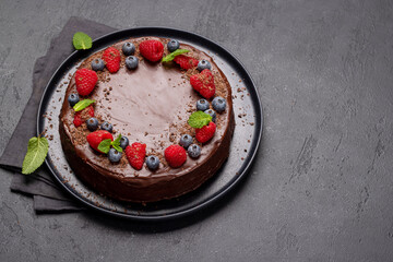 Chocolate cake dessert with fresh berries