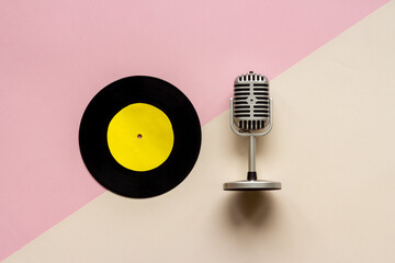 Retro style vinyl records with microphone top view.Record the music concept