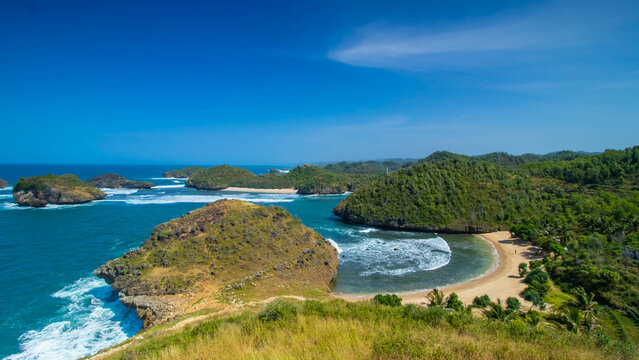 Kasap Beach is located in Pacitan, East Java, Indonesia whose scenery is similar to Raja Ampat Papua. Top view high angle of beautiful beach. Sunny weather during the day.