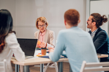 Multiracial business group of people having a meeting in an office