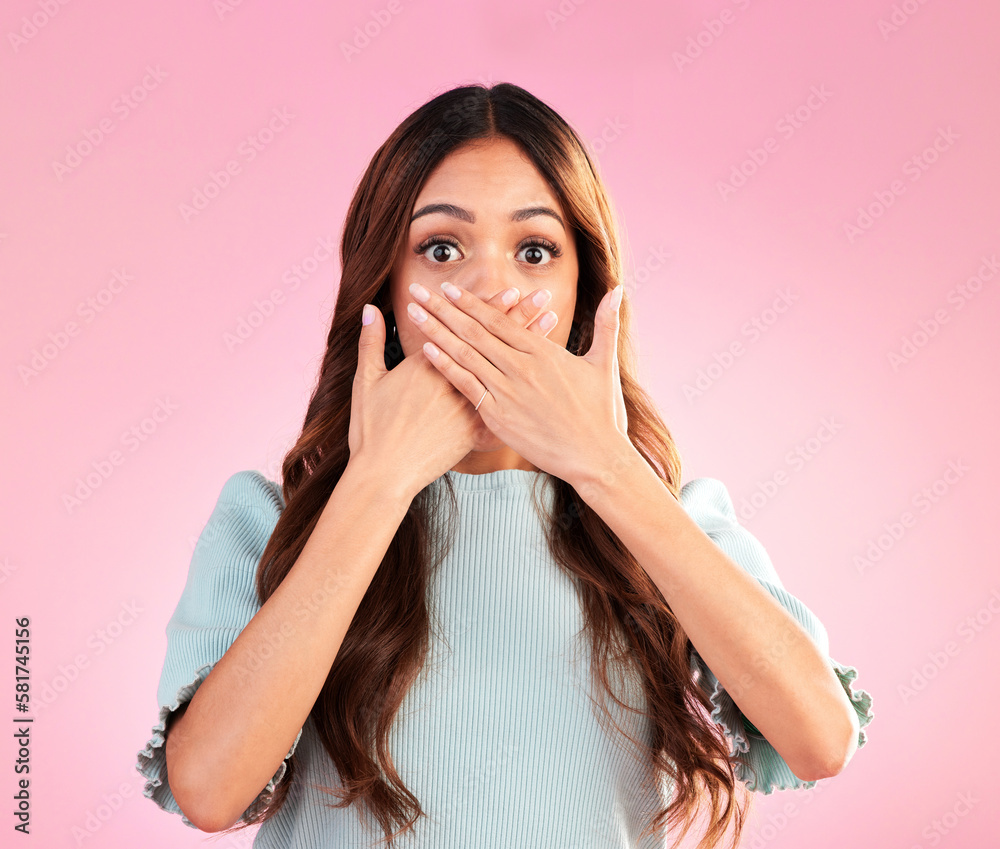 Poster Portrait, surprise and woman cover mouth, gossip and scared girl against pink studio background. Face, female and lady with hands on lips, shocked and wow with worry, scary and reaction with bad news