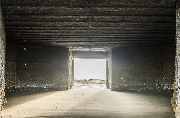 Entrance of a World War 2 bunker (The Atlantic Wall) on a French beach (la Grande Côte) at Saint-Palais-sur-Mer.