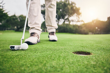 Golf, closeup and golfer or player hit ball and professional athlete training and putting on a...