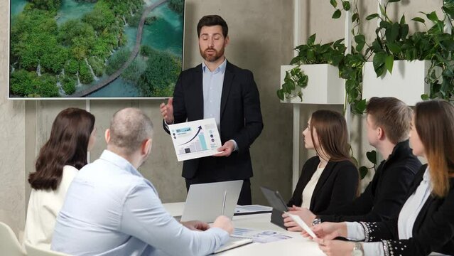 Business ecological meeting, people discuss solving environmental problems, reducing emissions, preserving the environment. Development, renewable energy, and responsible waste management. 