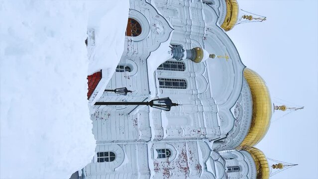 Belogorsky St. Nicholas Orthodox Missionary Monastery. Russia, Perm Krai, Belaya Gora. The temple on the hill in winter. Monastery on the background of snow. 4K