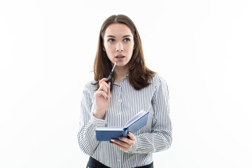 A close-up of a smiling female office worker holding a notepad and put on a white background, ready to take notes