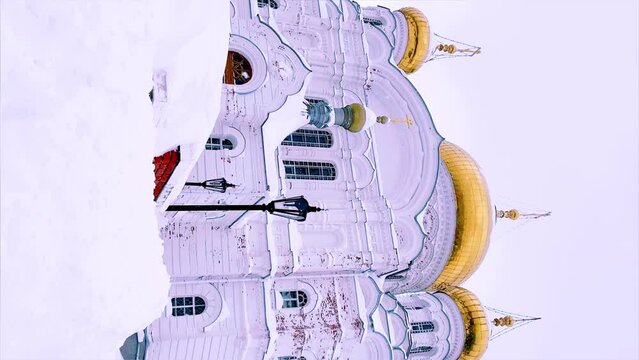 Belogorsky St. Nicholas Orthodox Missionary Monastery. Russia, Perm Krai, Belaya Gora. The temple on the hill in winter. Monastery on the background of snow. 4K