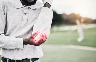 Sports, elbow pain and black man on golf course holding arm during game, massage and relief with health and wellness. Green, hands on injury for support and golfer with ache during golfing workout.