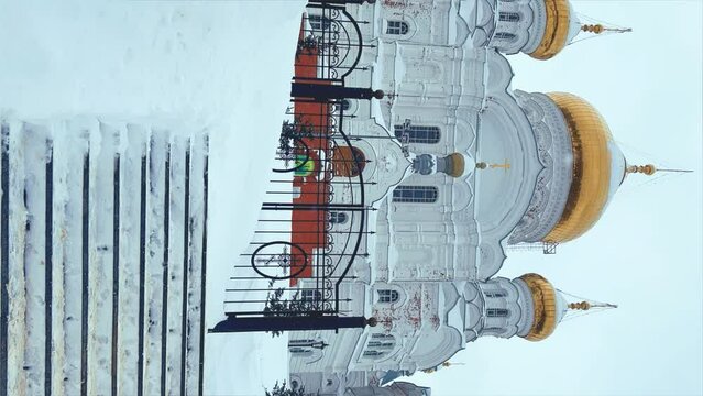 Belogorsky St. Nicholas Orthodox Missionary Monastery. Russia, Perm Krai, Belaya Gora. The temple on the hill in winter. Monastery on the background of snow. 4K