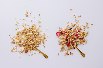 Two types of homemade granola on a white background