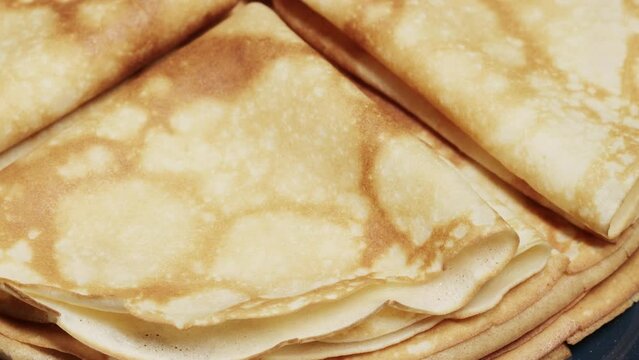 Fried pancakes in a stack and corners