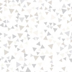 Geometric seamless pattern of pale small gray and beige triangles for textile, paper and other surfaces