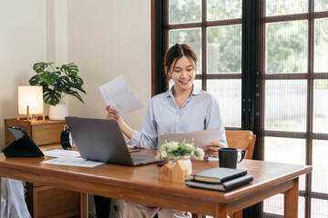 Female freelance is holding document to reading business data an