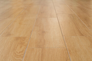 Floor tiles imitation wood grain inside the house for the background.