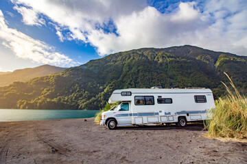 Motorhome in Chilean Argentine mountain Andes. Family trip travel vacation on Motorhome RV in...