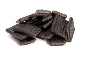 Natural licorice candy close-up isolated on white
