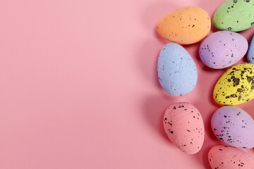 decorative easter eggs on pink background. copy space for text