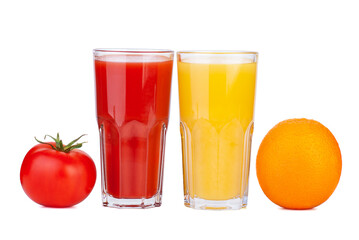 Drinking glass with tomato and orange juice and ripe fresh fruits near