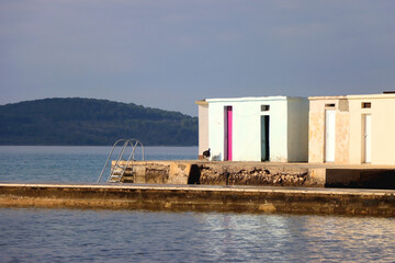 Obraz premium Colorful changing cabins, landmark on beach Jadrija, in Sibenik, Croatia.