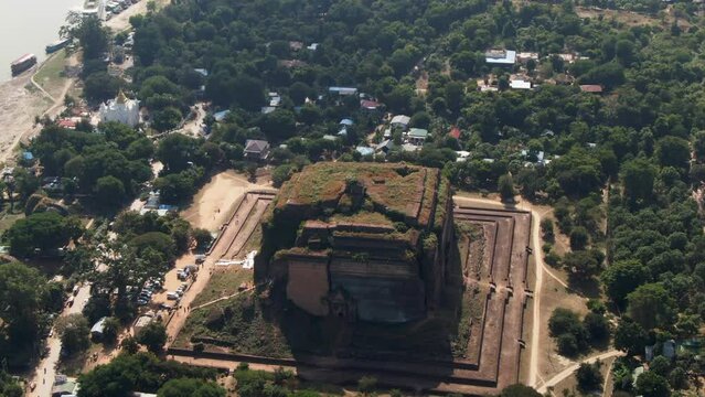 Drone panning shot over the Mingun Pahtodawgyi, the largest unfinished Pagoda in Myanmar.Slow Reveal