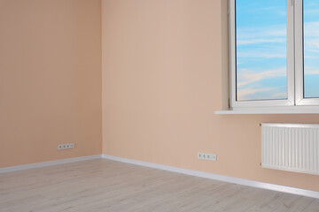 New empty room with clean windows and light walls