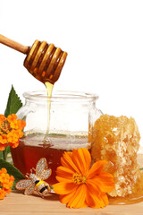 Fresh Local Honey With Wildflowers on White Background