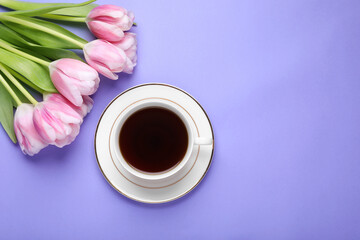 Cup of coffee and beautiful tulips on light purple background, flat lay. Space for text