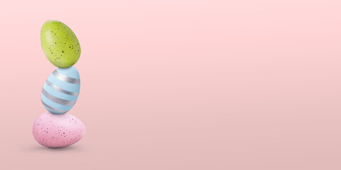 Stack of Easter eggs on pink beige background, space for text