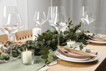 Stylish elegant table setting for festive dinner indoors